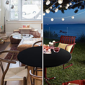 Obstal round table cloth showing dual-sided waterproof coating on the top surface.
