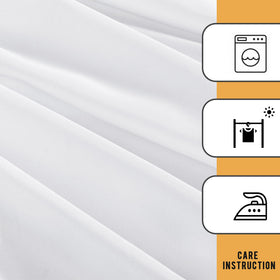 Fitted Obstal tablecloth on a six-foot table with neat, secure edges.