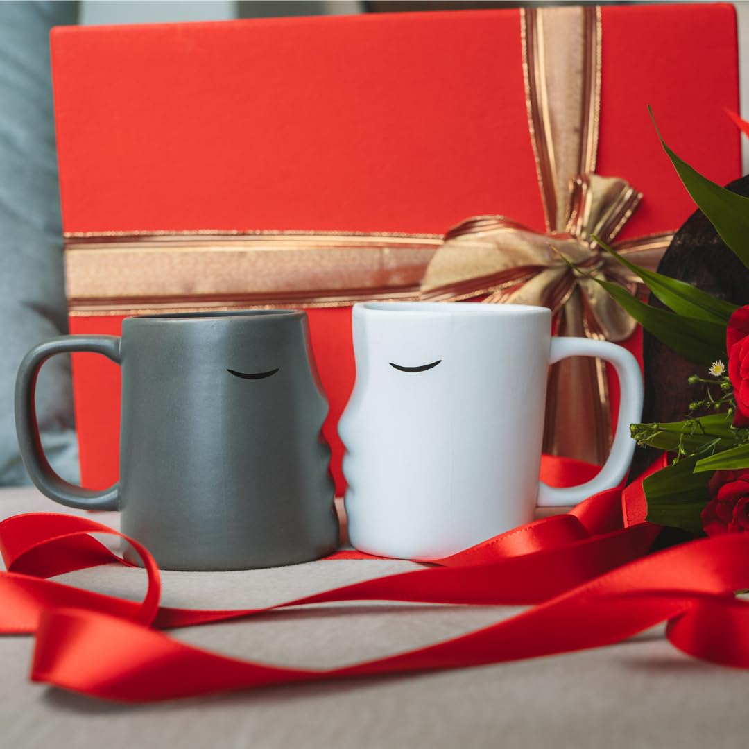 Occasionals kissing couple mug set 12 oz capacity ideal for coffee or hot chocolate.