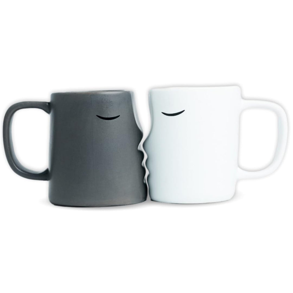Occasionals kissing couple mug set front view for shared morning coffee rituals.