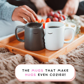 Occasionals kissing couple mug set side-by-side, perfect for daily tea or coffee.