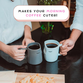 Occasionals kissing couple mug set with coffee in a cozy morning scene.