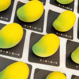 OCPO Kitchen mango silicone mold for cake decoration with vibrant 3D mango shapes.
