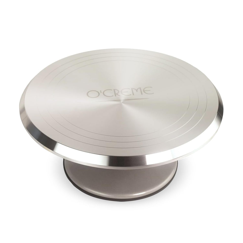 O'CREME 12-inch cake turntable with stable surface for precise icing.