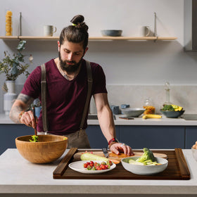 Oenalw wooden serving tray doubles as a practical prep surface.