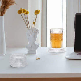 OGANAZI striped-pattern coasters add elegant detail to any decor