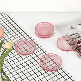 OGANAZI Striped-border coaster adds subtle texture and style