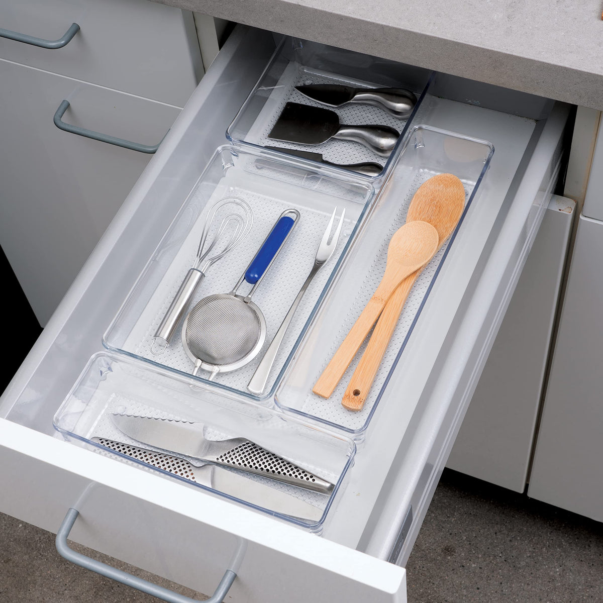 Oggi clear drawer organizer in bathroom stores makeup neatly and cleans easily.