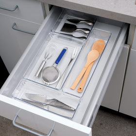 Oggi clear drawer organizer in bathroom stores makeup neatly and cleans easily.