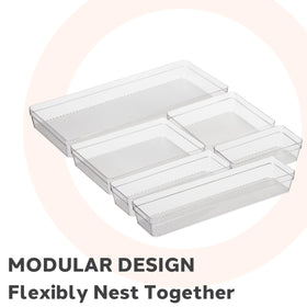 Oggi clear drawer organizer in kitchen drawer keeps utensils neatly separated.