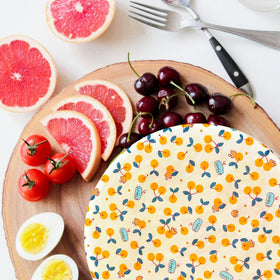 OHIYO multi-use kitchen cover protects feta, fruits, and grains.