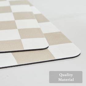 Ohocut checkered drying mat on kitchen counter helps keep surfaces dry after use.