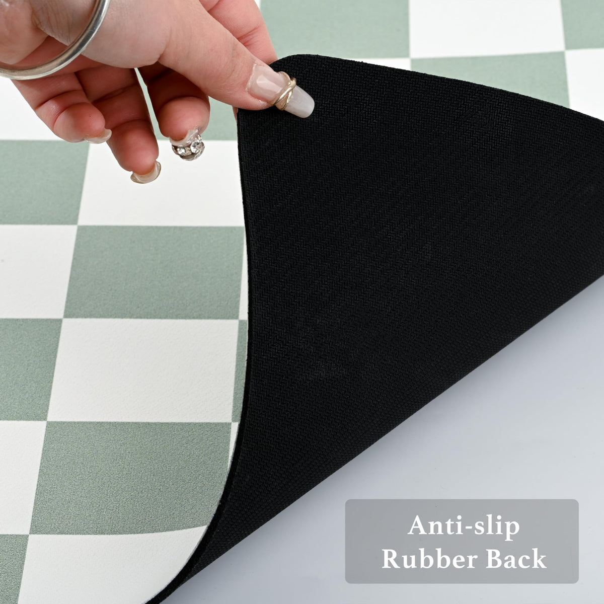 Ohocut checkered drying mat in sage placed on dining table for spill management