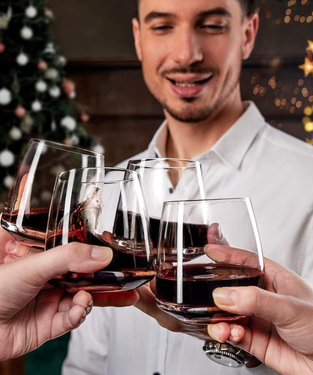 OJA stemless wine glasses on a dining table show a modern, stable base.