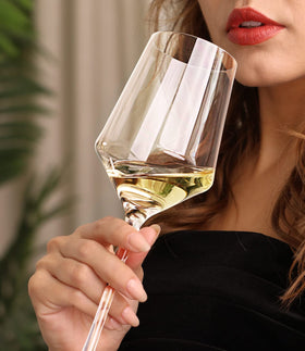 OJA glasses with thin rims and long stems for refined sipping.