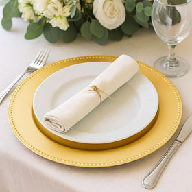 Catering event tabletop setup featuring Okllen charger plates