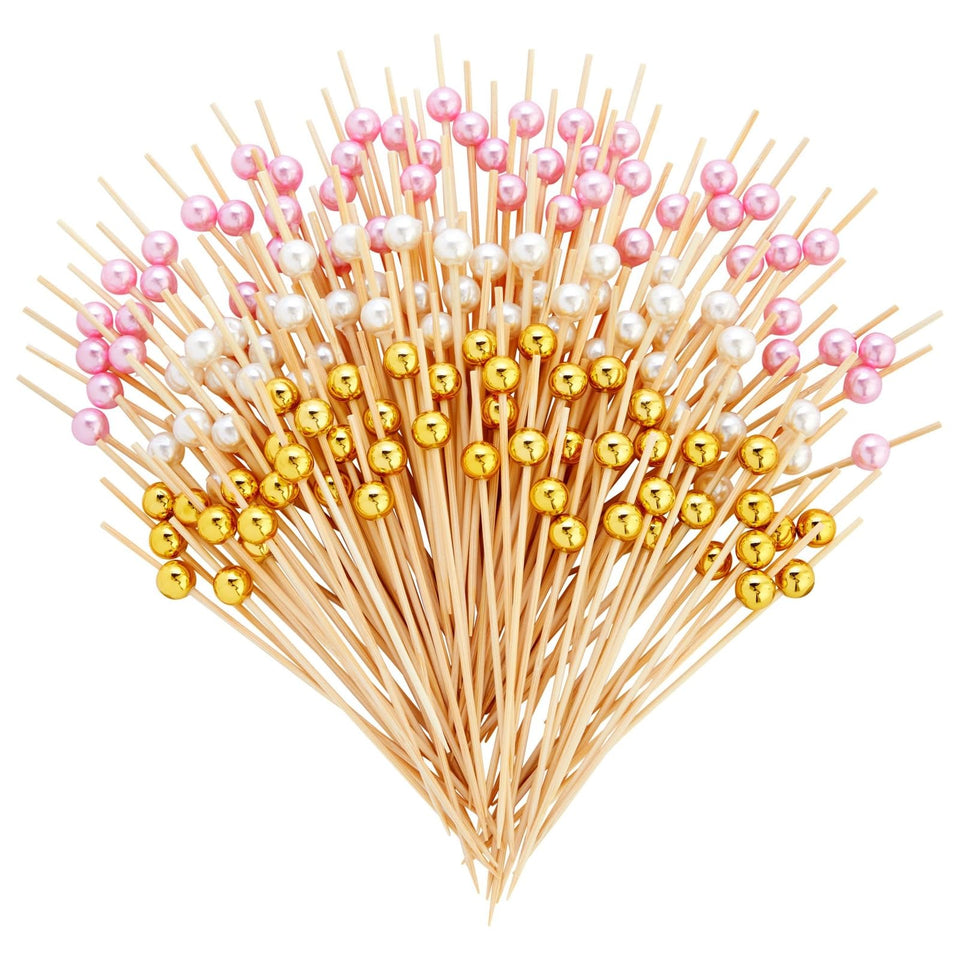 Okuna Outpost bamboo pearl toothpicks with white pink gold pearls for elegant appetizers.