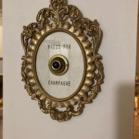 Okuorze gold framed wall sign brings festive flair to any room.