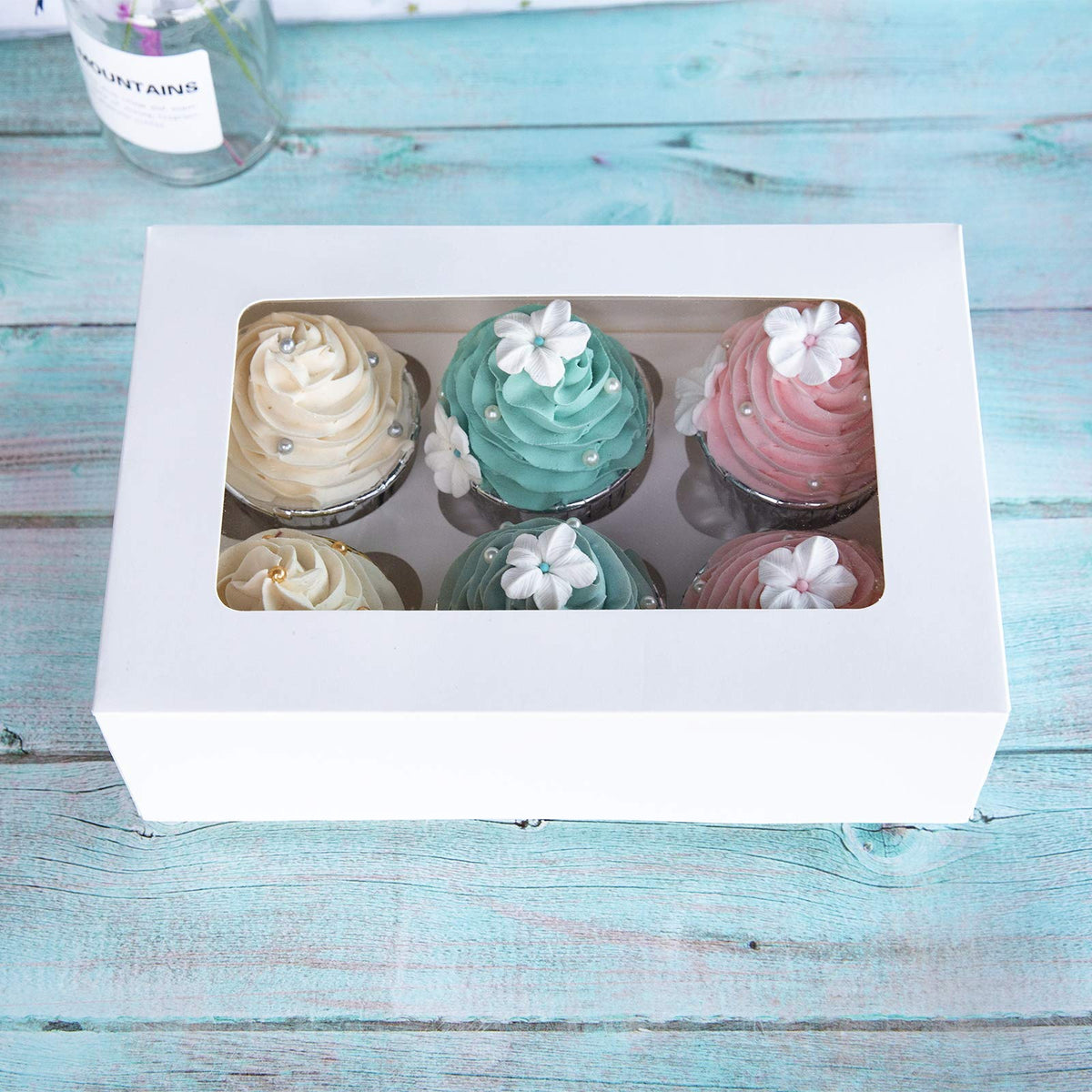 ONE MORE Cupcake Boxes insert base keeps cupcakes upright during transport.