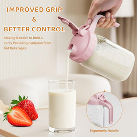 OneDream pink flip cap lid on a glass pitcher preventing dust and spills.
