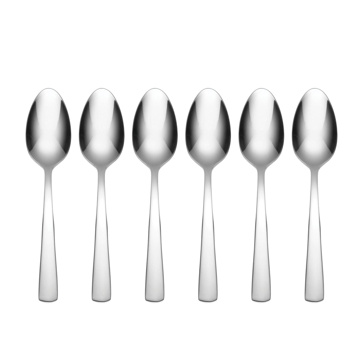 Oneida Aptitude teaspoons on a dining table, highlighting durable stainless steel for daily use.