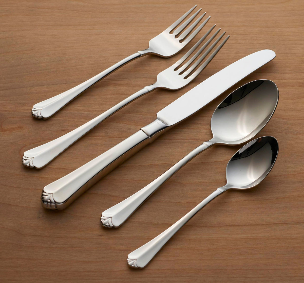Oneida Juilliard pierced serving spoon for sauces and gravies.
