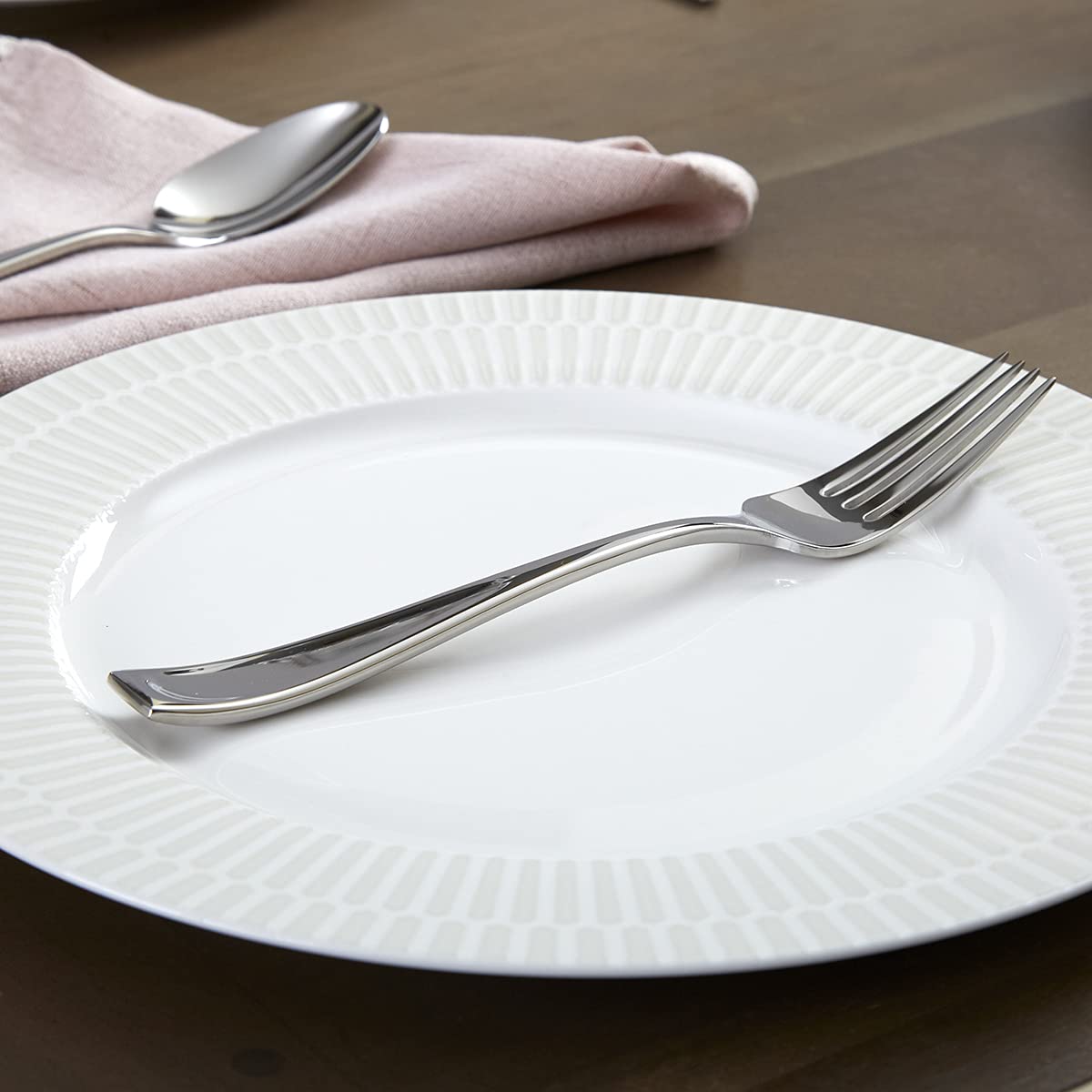Oneida Moda service for four, ideal for formal dining and casual weeknights.