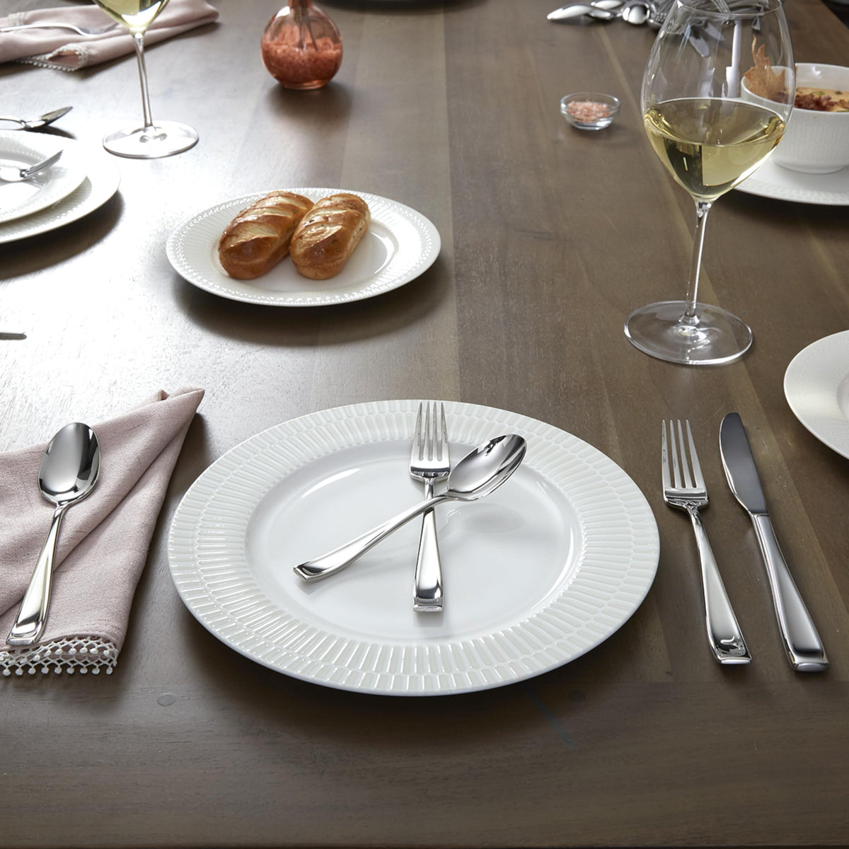Oneida service for four silverware set ready for small gatherings and meals.