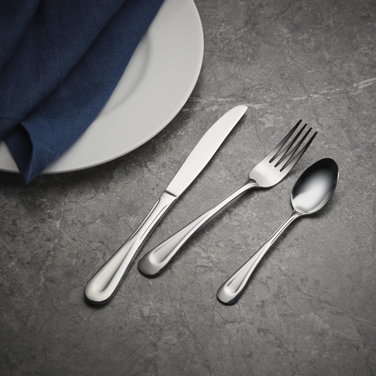Oneida sugar spoon complementing the set for tea and coffee service