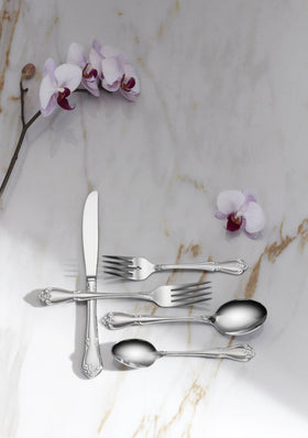 Oneida True Rose teaspoons shown in dishwasher-safe design for easy cleanup.