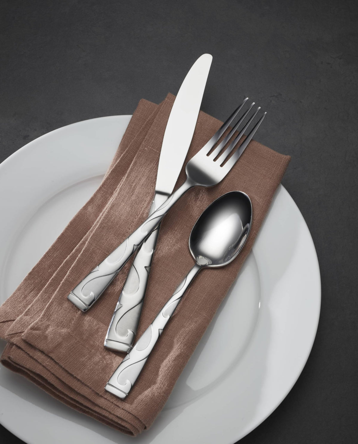 Oneida Tuscany flatware showing dishwasher-safe design for easy cleanup.
