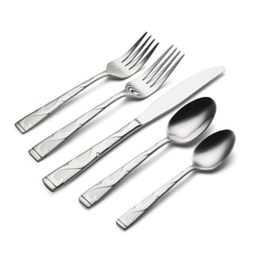 Close-up of Oneida Tuscany flatware scrollwork and frosted centers.