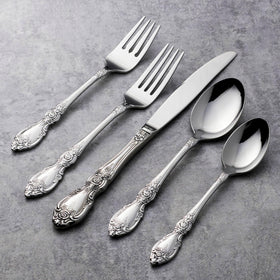 Oneida Wordsworth serving fork with intricate motif for refined entertaining.
