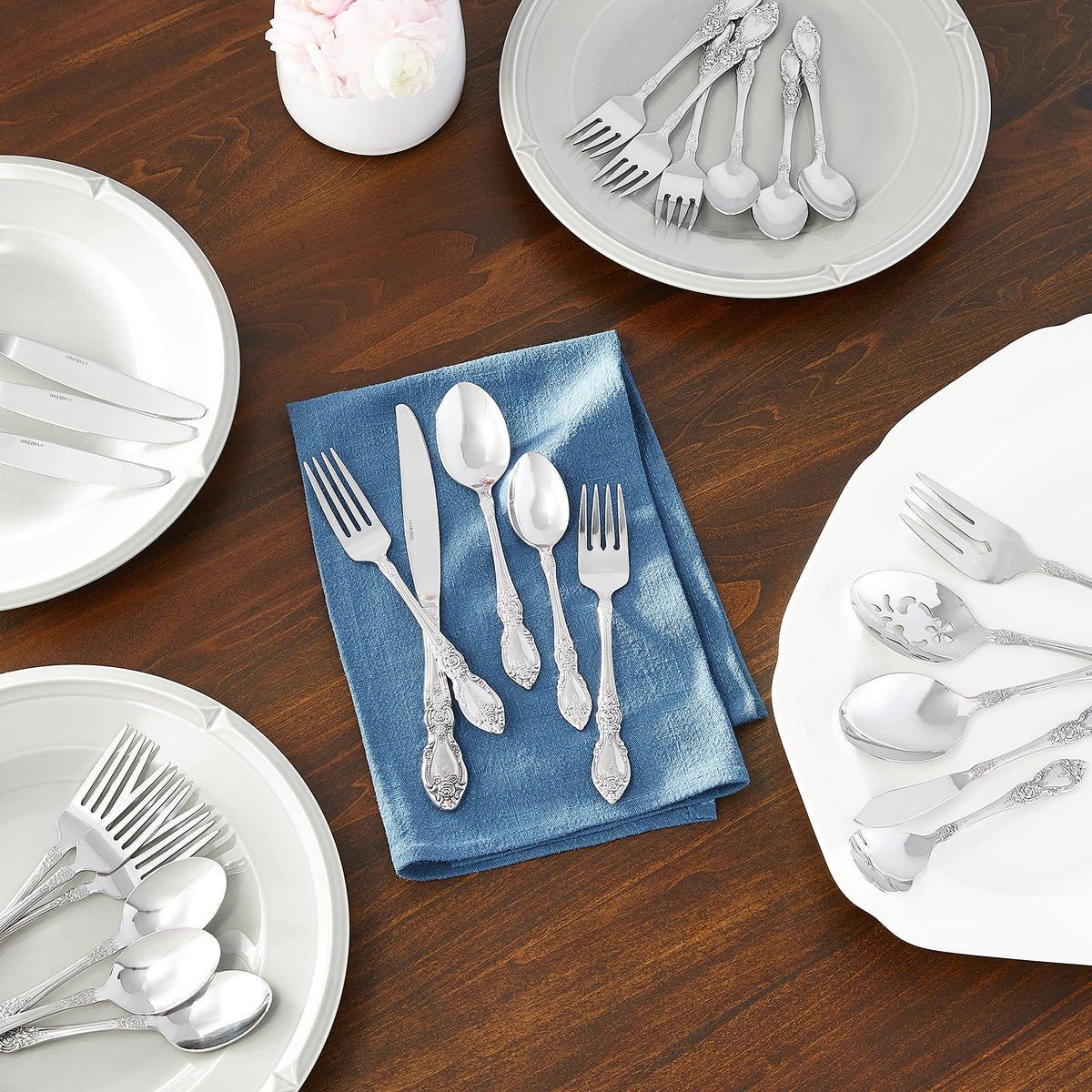 Oneida Wordsworth dinner fork with floral handles for a timeless table.