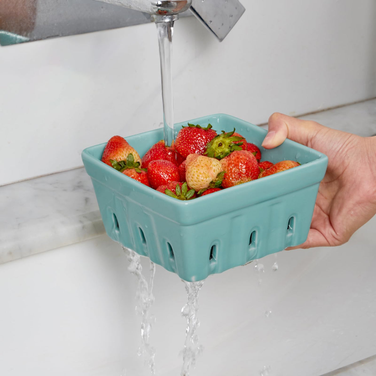 ONEMORE Berry Basket enhances kitchen decor while holding fresh fruit on the countertop.