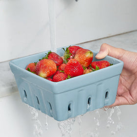 ONEMORE Berry Basket blue shown on kitchen counter for fresh produce display.