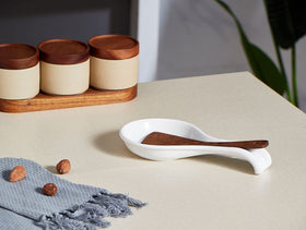 ONEMORE white spoon rest complements contemporary kitchen decor.