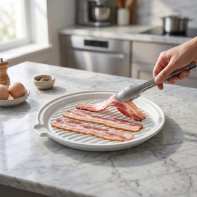 ONEMORE ceramic white bacon dish displayed as an elegant serving plate
