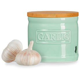 ONEMORE garlic keeper with lid in ceramic blue keeps garlic dry and fresh.