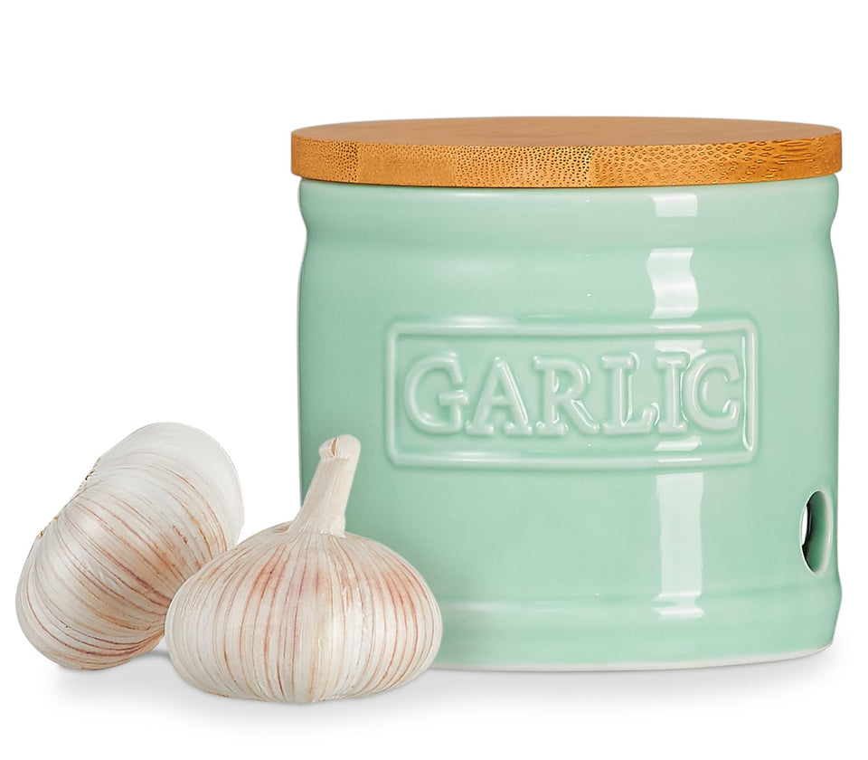 ONEMORE garlic keeper with lid in ceramic blue keeps garlic dry and fresh.