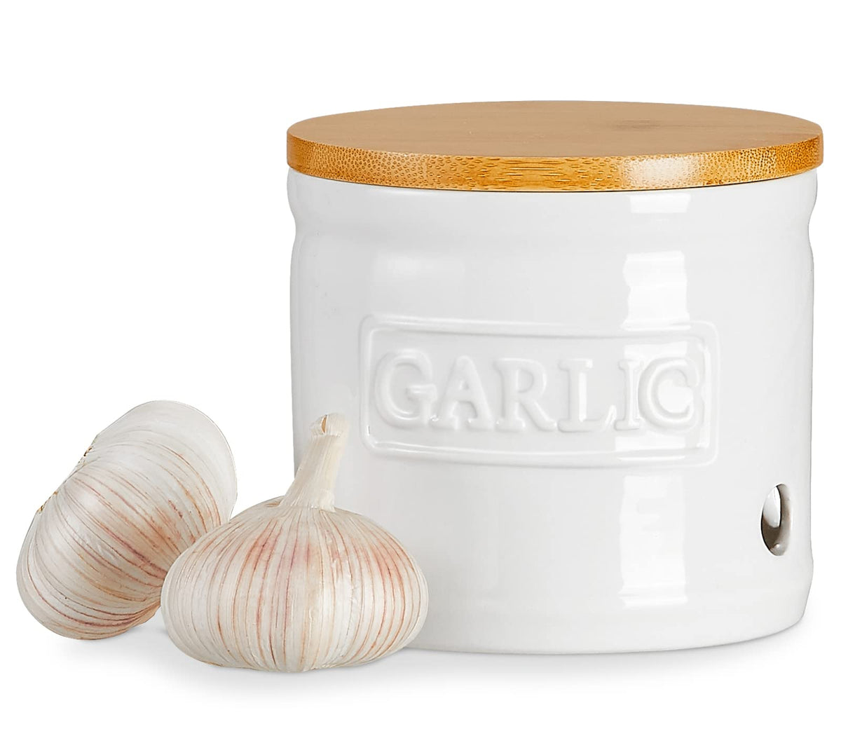 ONEMORE garlic keeper with lid in white porcelain on a clean kitchen counter