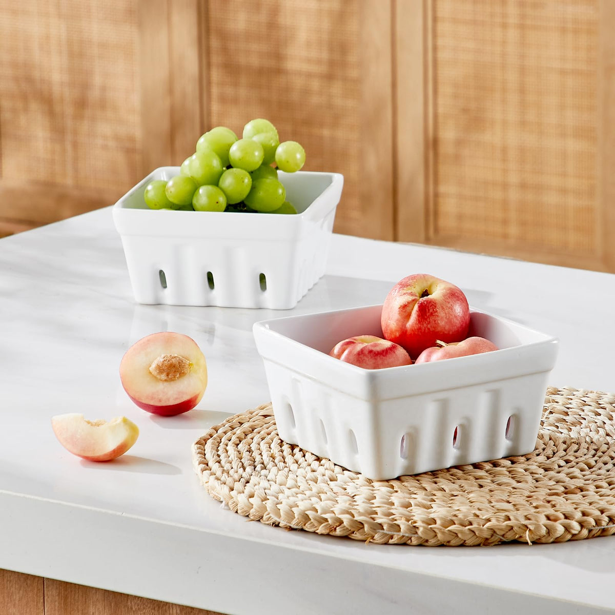 ONEMORE square white fruit bowl keeps berries organized on the counter.