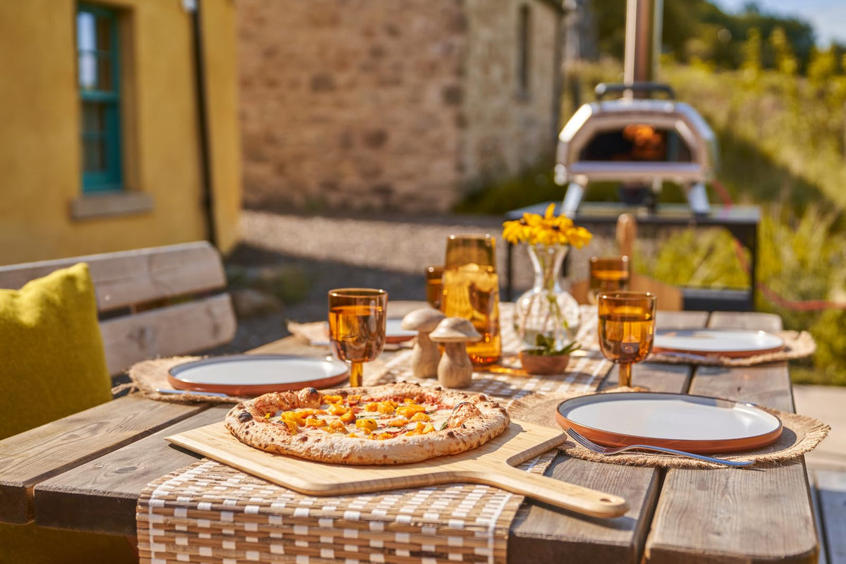 Ooni 12-inch bamboo pizza peel as a pizza oven accessory setup