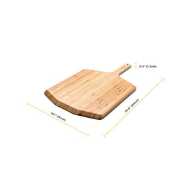 Ooni bamboo serving board presents freshly baked pizza.