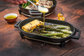 Ooni Grizzler Pan on hob for quick weeknight dinners.