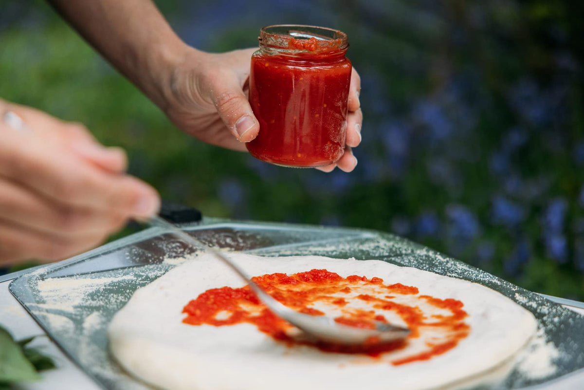 Ooni pizza prep tool helps top and launch pizzas in ovens