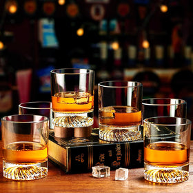 OPAYLY glasses in use with bourbon capture rich aroma and color