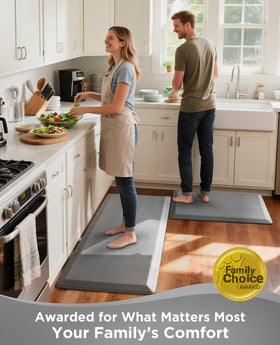 Ophanie standing mat in front of sink shows resilient support during chores.
