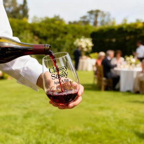 Opininqo Funny Gag Wine Glass in hand, a fun daily ritual.