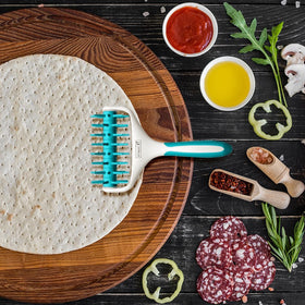 Versatile tool for pizzas, pies, crackers, and flatbreads.